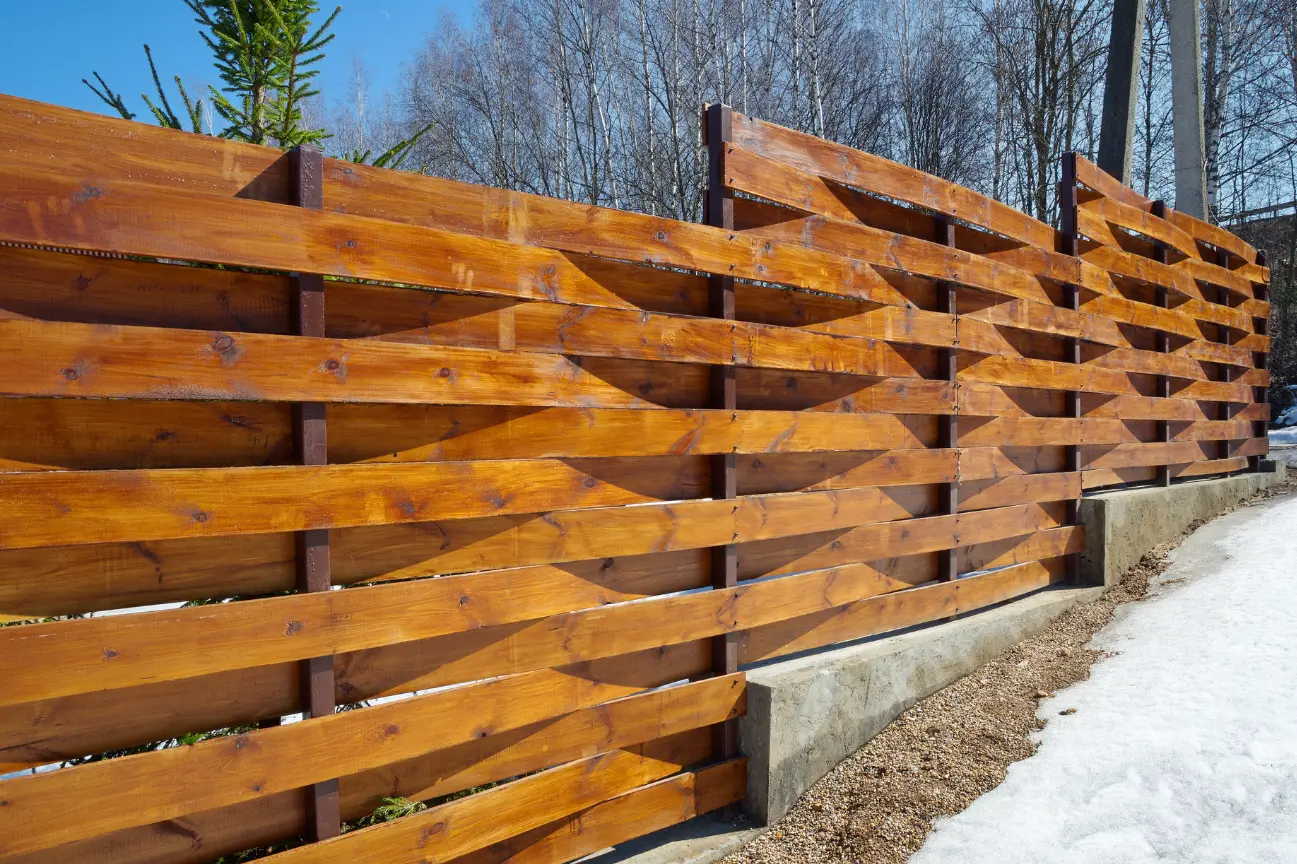 Unique timber fence designed by Balcony Construction Christchurch professional Fencing Christchurch team.